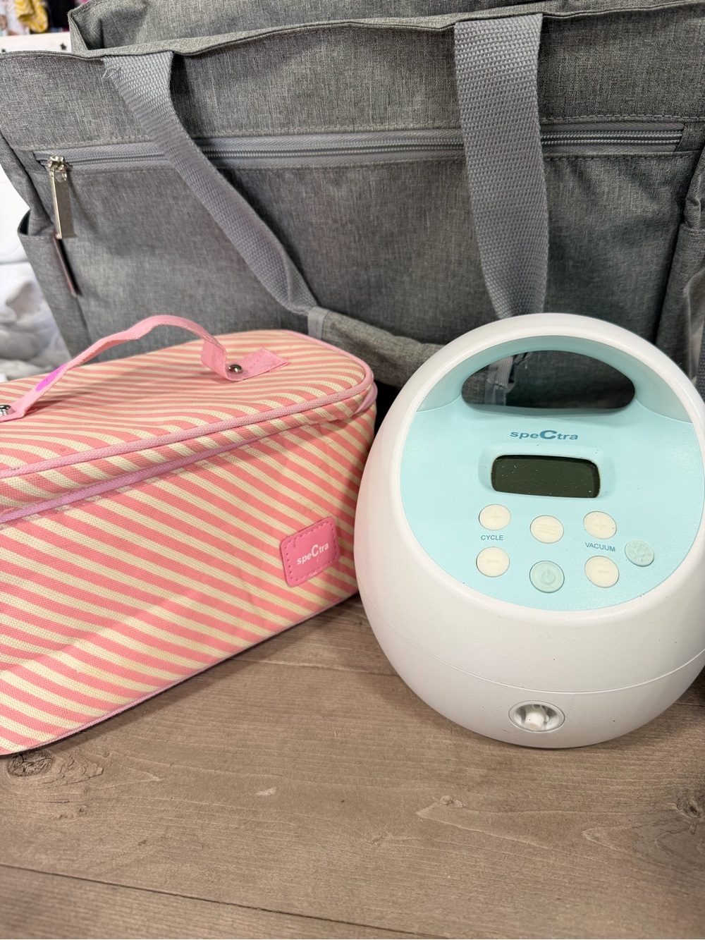 Spectra Portable Breast Pump with Pink Striped Cooler Bag
